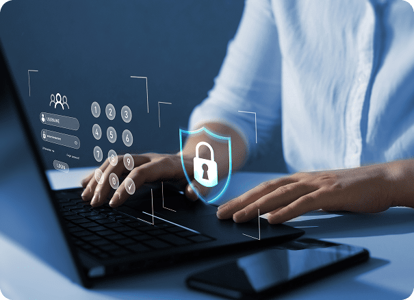 GettyImages-1456782892 Person typing on laptop with security icons.